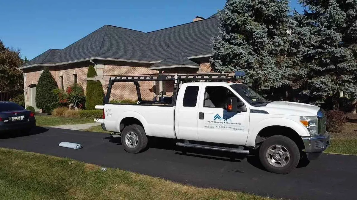 ASAP Roofing crew at a residential job site